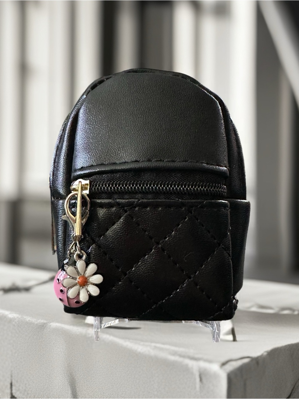 Black Quilted Mini Backpack Bag with Floral Charm